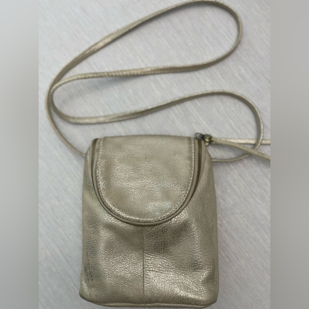 HOBO Fern crossbody in soft gold leaf leather.